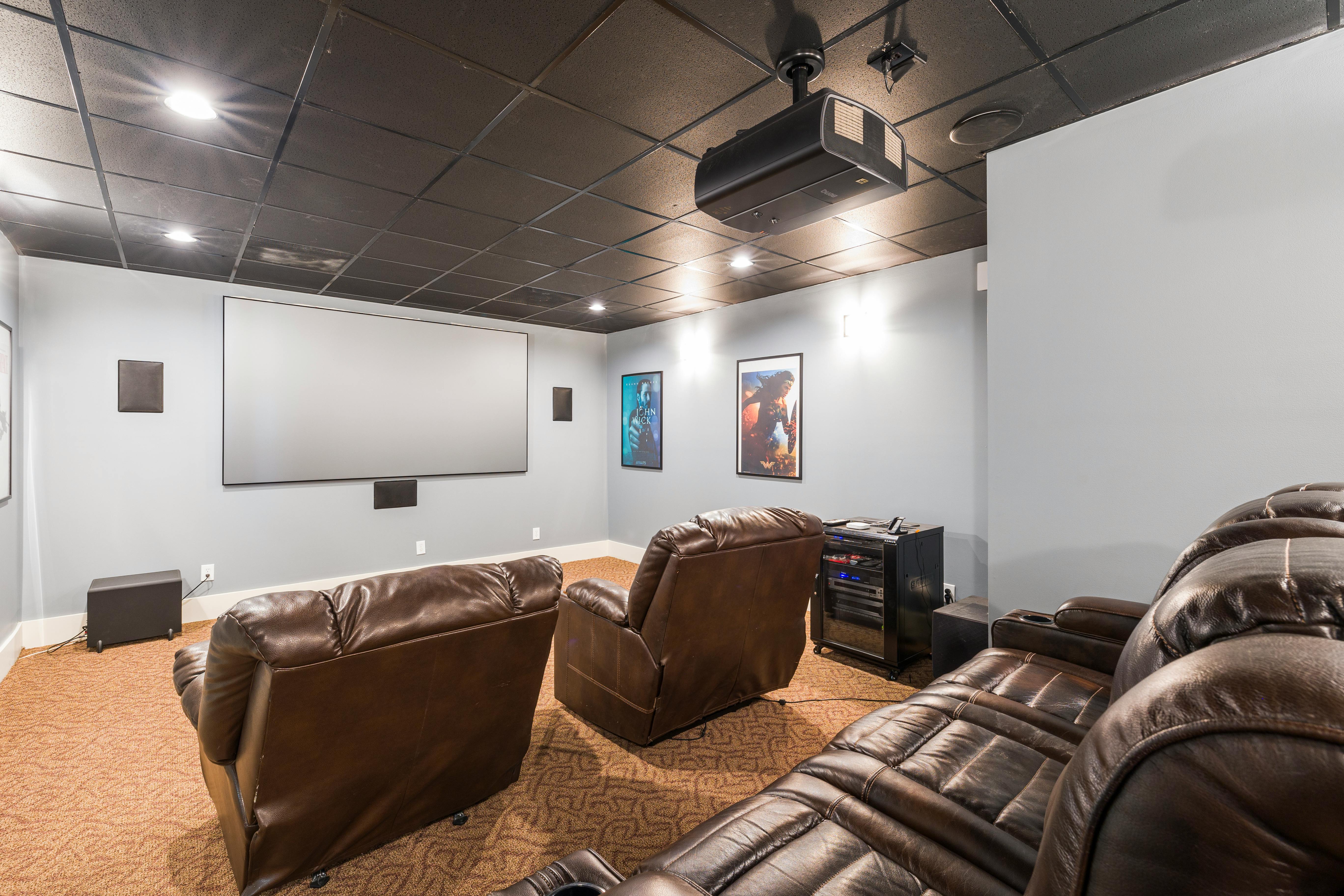 Home theater with projector and surround speakers